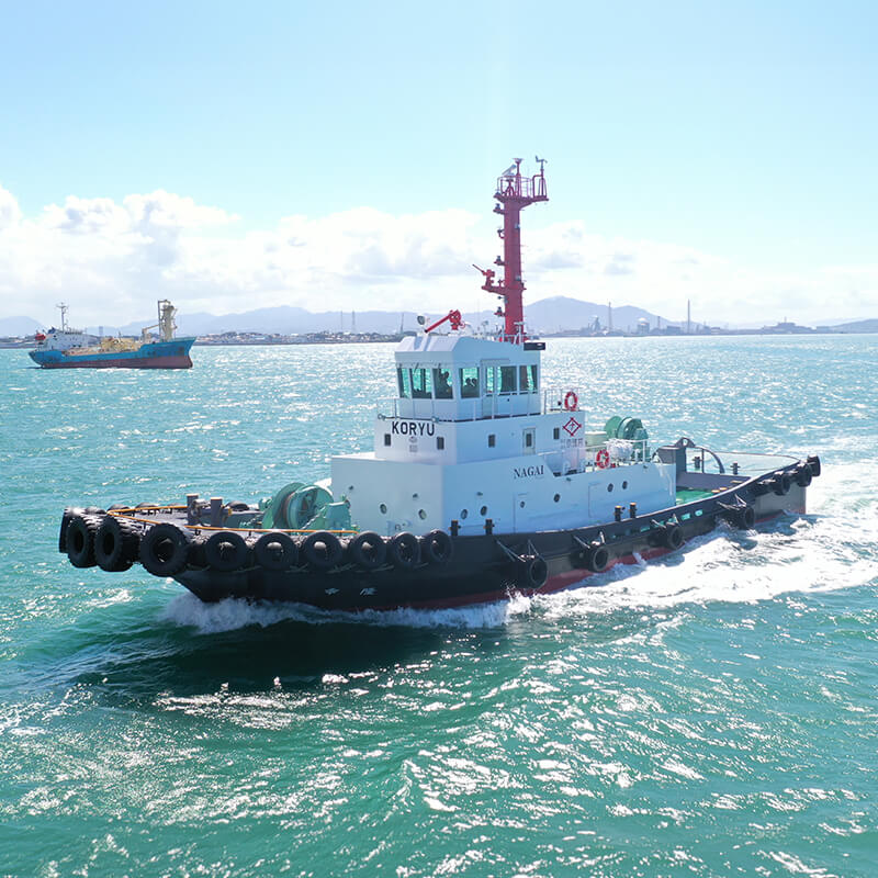 沖に出るタグボート